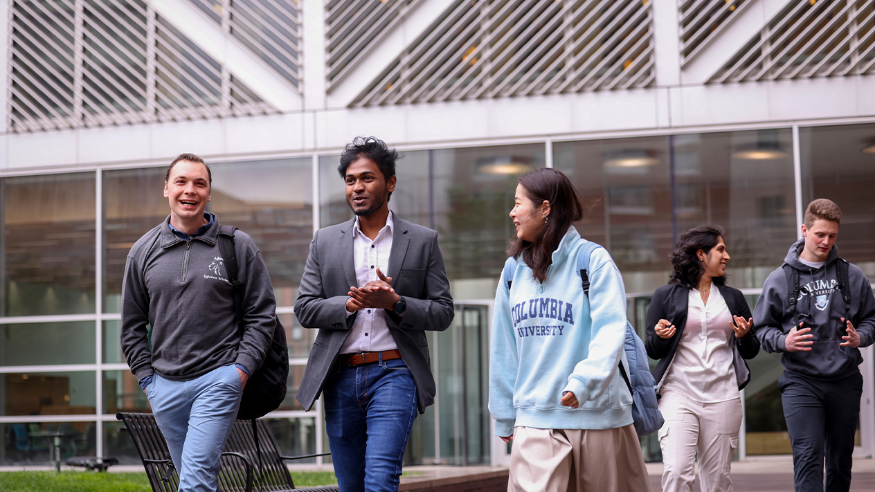 A group of students walking on campus