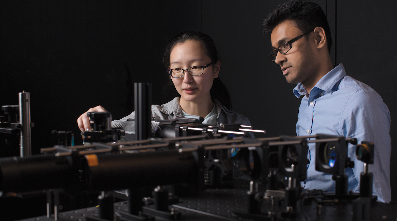 Two Columbia Engineering students work on a research project.